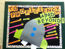 To Proficiency & Beyond! - Space Themed Back-To-School Bulletin Board Idea